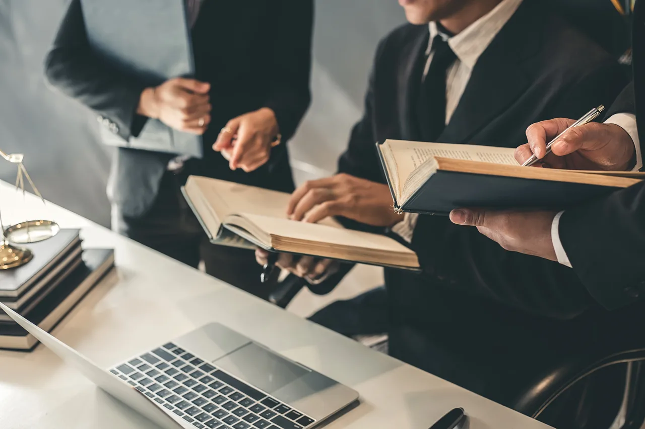 Attorney welcoming a client into a private Los Angeles consultation.